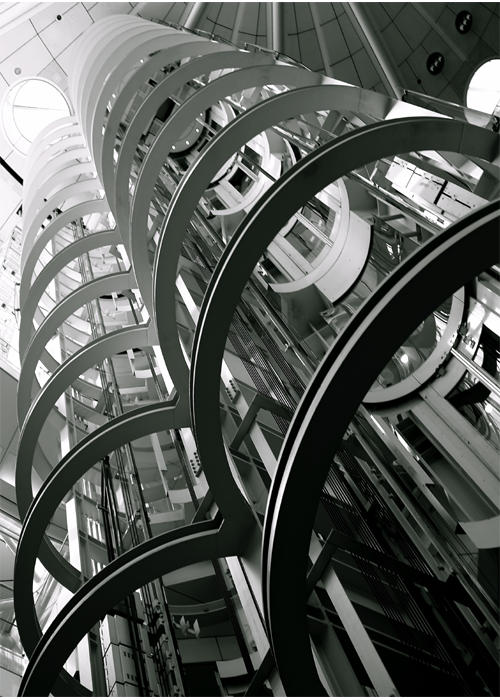 Machine-room-less elevator system for space-efficient buildings